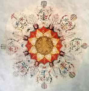 a drawing of a colorful mandala on a wall at Dimora Storica in Petrignano