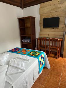 Postel nebo postele na pokoji v ubytování NayMar Paraty Casa Familiar