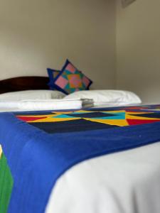 Postel nebo postele na pokoji v ubytování NayMar Paraty Casa Familiar