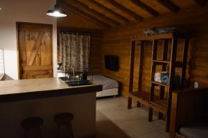 Televisyen dan/atau pusat hiburan di Finca La Vilina - Cabaña 1