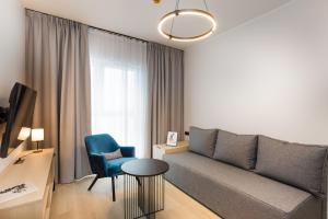Aparthotel City Break Plac Wolności 6的休息区