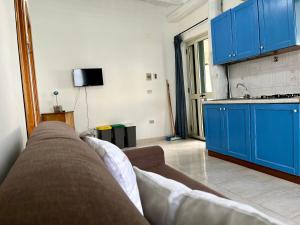 A kitchen or kitchenette at Residence Araba Fenice Tropea