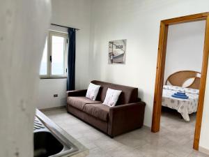 A seating area at Residence Araba Fenice Tropea