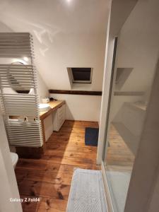 a small bathroom with a sink and a toilet at Brussels 1904 in Brussels