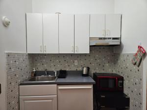 Large Room in Charming Townhouse 주방 또는 간이 주방