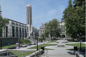 a building with a clock tower in the middle of a park at Large Room in Charming Townhouse in New York