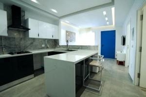 Η κουζίνα ή μικρή κουζίνα στο La cozy suite +4 φωτογραφίες