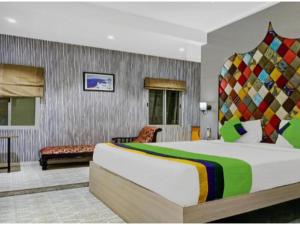 Voodi või voodid majutusasutuse ViBe Blue Hotel - By NIKETAN toas