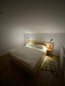 Postel nebo postele na pokoji v ubytování Hirsch Chalet Apuseni