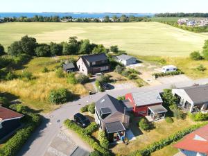 an aerial view of a house and a field at Holiday apartment in Thuringia in Zierow