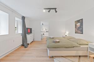 Ένα ή περισσότερα κρεβάτια σε δωμάτιο στο Wohlfühloase Flacht