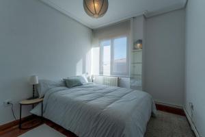 Кровать или кровати в номере alsua street apartment