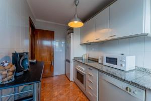 Кухня или мини-кухня в alsua street apartment
 +3 фотографии