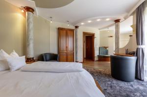 Rúm í herbergi á Hotel Himmelreich