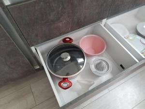 a model of a toy kitchen with various dishes at APARTMENT NEVERA in Rijeka