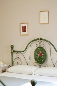 Postel nebo postele na pokoji v ubytování Antico Podere Sant'Anna