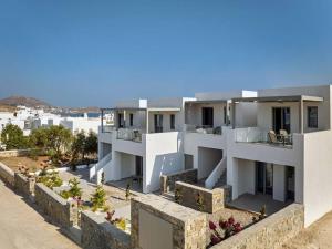 a view of a white apartment building at Sapphire apartment - Paros Gem in Naousa