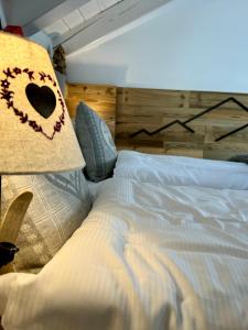 Llit o llits en una habitació de Si Mezzana Home