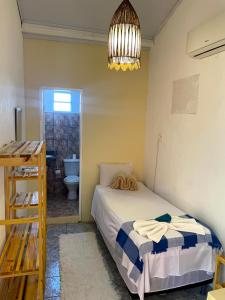 Postel nebo postele na pokoji v ubytování Pousada Vila Nativa