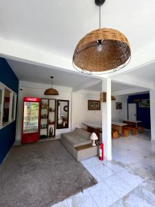 a living room with a couch and a table at Pousada Vila Nativa in Arraial d'Ajuda