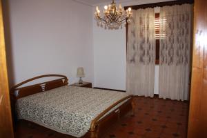En eller flere senge i et værelse på Casa Viola
