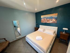 Llit o llits en una habitació de Appartamento Mellini
