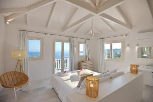Кровать или кровати в номере Anemone Villas hotel