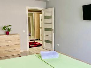 Ένα ή περισσότερα κρεβάτια σε δωμάτιο στο Apartament comfort Centru