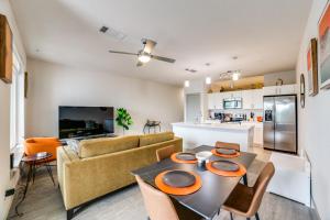 a kitchen and living room with a table and chairs at Downtown Apartment on the Riverwalk with parking 1339 in San Antonio