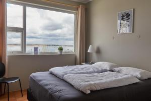 Letto o letti in una camera di Hótel Laugarvatn
