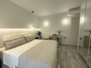 Postel nebo postele na pokoji v ubytování Ixia home