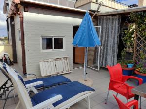 Balkón nebo terasa v ubytování Habitacion Familiar en un Ático con gran terraza y,cocina ,en la playa