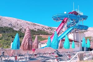 a water slide at a water park at City Pag Apartment in Pag