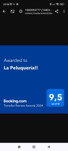 a screenshot of a cell phone with a blue screen at La Peluquería!! in Ronda