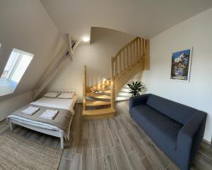 Postel nebo postele na pokoji v ubytování Apartmány Monastery Suites Žireč