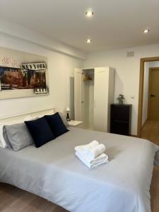 Posteľ alebo postele v izbe v ubytovaní Manrique Rooms + 8 fotografií