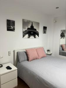 Posteľ alebo postele v izbe v ubytovaní Manrique Rooms