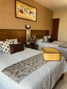 Postel nebo postele na pokoji v ubytování Hotel el Leñador