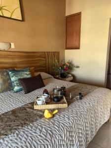 Postel nebo postele na pokoji v ubytování Hotel el Leñador