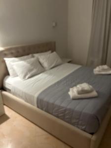 Postel nebo postele na pokoji v ubytování Manarola apartament