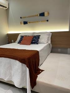 Ένα ή περισσότερα κρεβάτια σε δωμάτιο στο Flat em Muro Alto - Porto de Galinhas - Makia Térreo 018D +21 φωτογραφίες