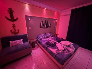 Voodi või voodid majutusasutuse Le Voilier - Studio Moderne Vue Mer Panoramique avec Piscine toas
