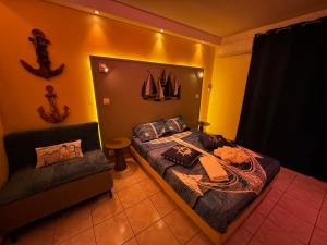 Voodi või voodid majutusasutuse Le Voilier - Studio Moderne Vue Mer Panoramique avec Piscine toas
