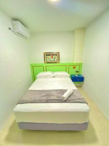Postel nebo postele na pokoji v ubytování Hostal Marle + 10 fotografií
