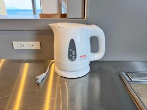 Kuchyň nebo kuchyňský kout v ubytování Beach SPA TSUDA 0 Cero棟