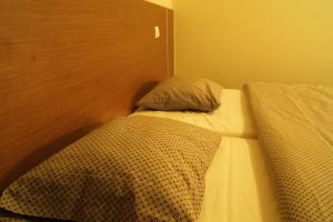 Łóżko lub łóżka w pokoju w obiekcie Biały Bór Rooms