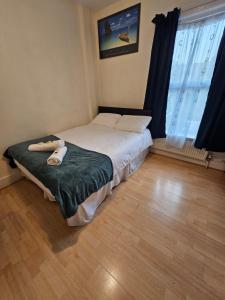 Posteľ alebo postele v izbe v ubytovaní Bruce Rooms
