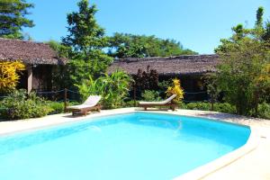 Bazén v ubytování Tropic Hôtel nebo v jeho okolí