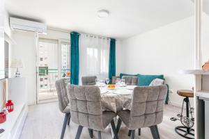 a dining room with a table and chairs at Apartments with a parking space Split - 22452 in Split