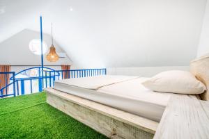 Anny Guesthouse by ecommerceloka客房内的一张或多张床位